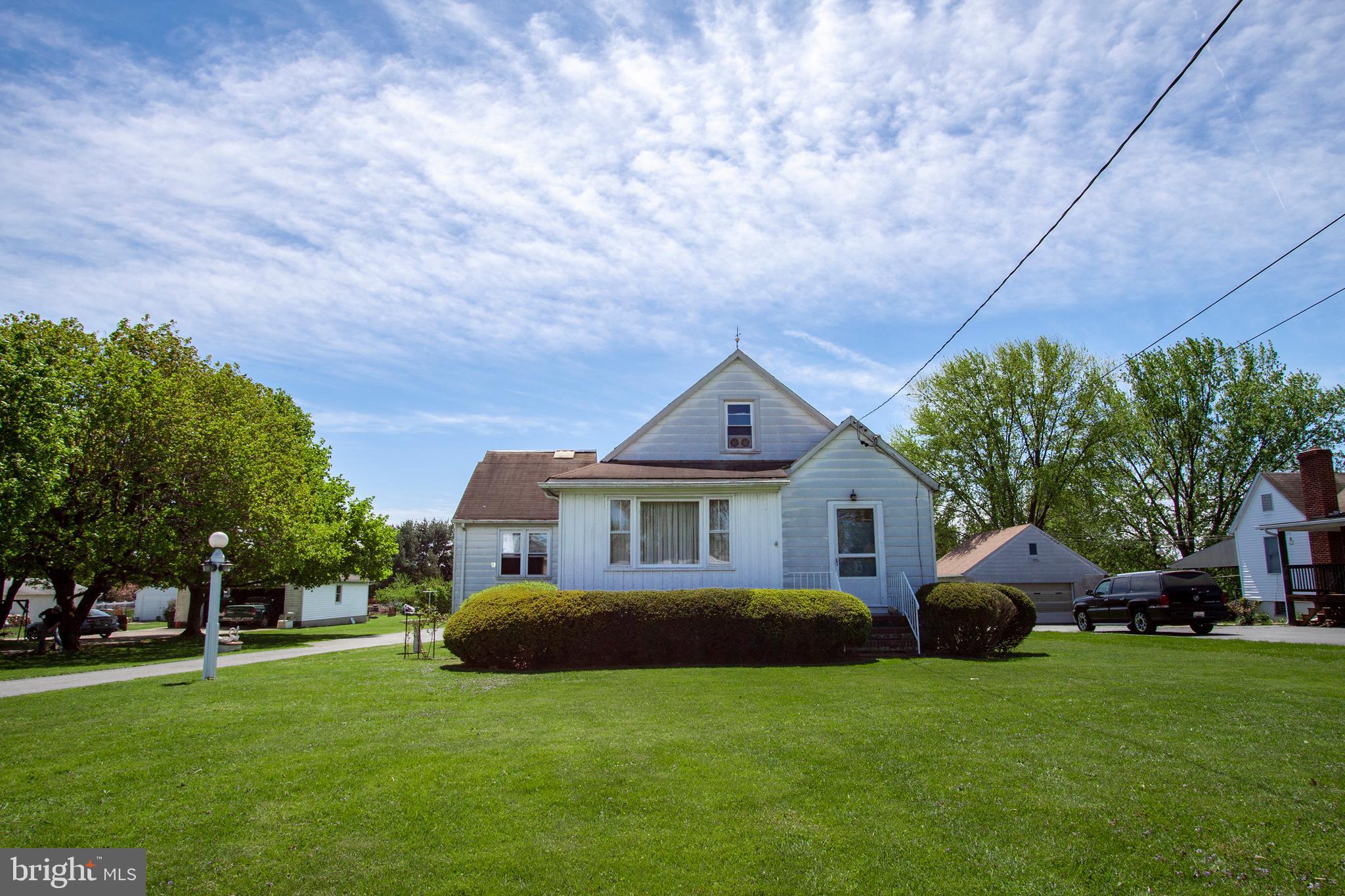 4703 Forge Road Perry Hall, MD 21128 - Photo 2 of 47 a front view of a house with garden