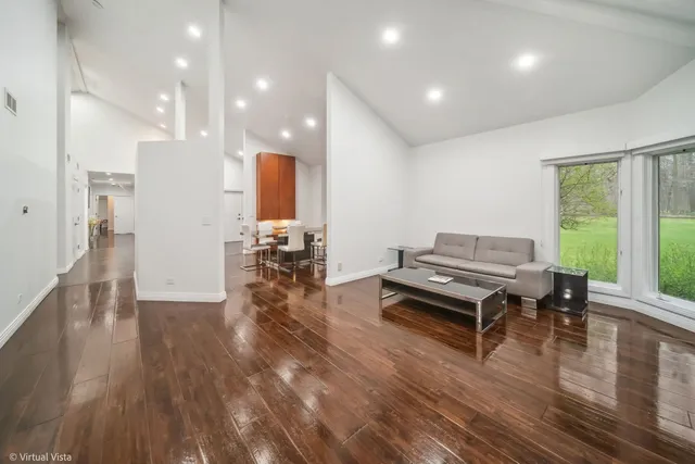 a kitchen with granite countertop wooden cabinets a sink and dishwasher