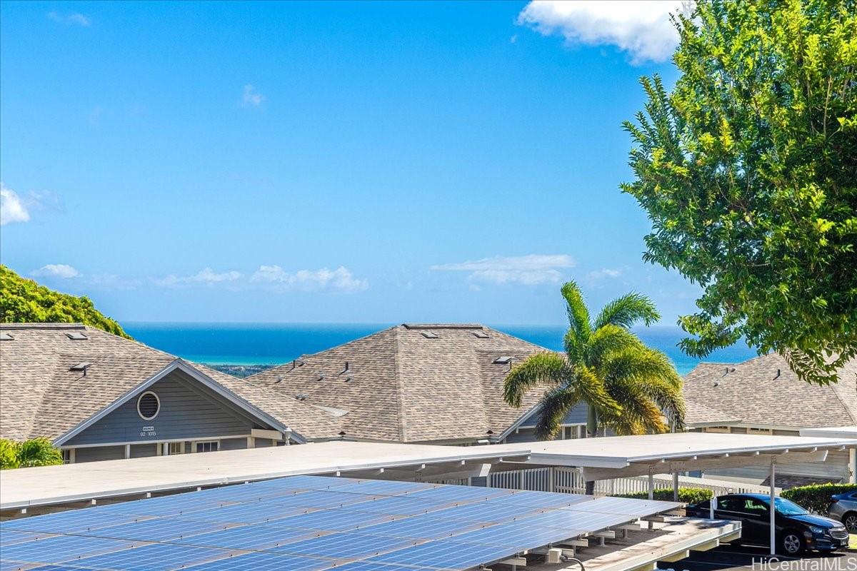 92-1019 Alaa Street, Unit 16203 Kapolei, HI 96707 - Photo 12 of 25 a view of a swimming pool with an outdoor space