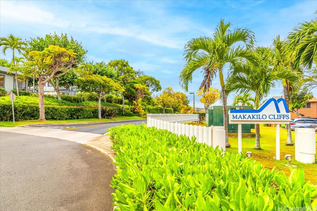 92-1019 Alaa Street, Unit 16203 Kapolei, HI 96707 - Photo 2 of 25 a view of swimming pool with an outdoor space