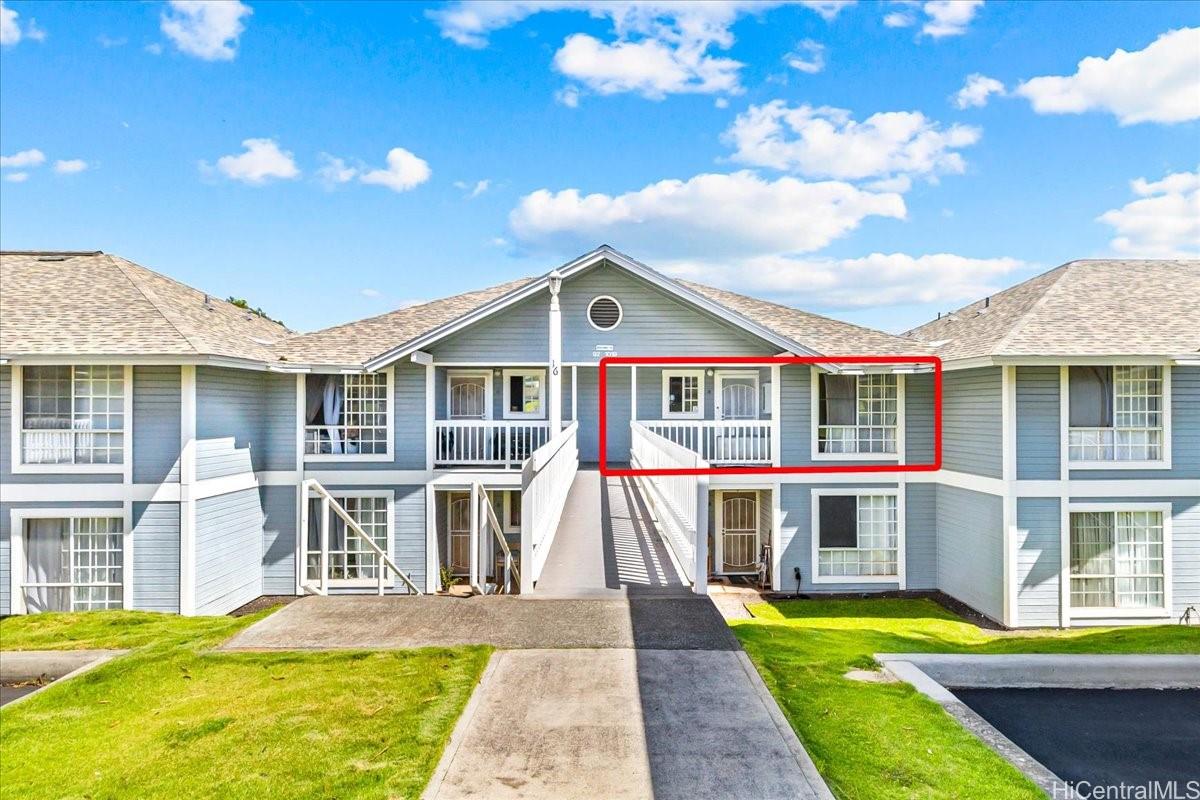 92-1019 Alaa Street, Unit 16203 Kapolei, HI 96707 - Photo 24 of 25 a view of a house with a swimming pool