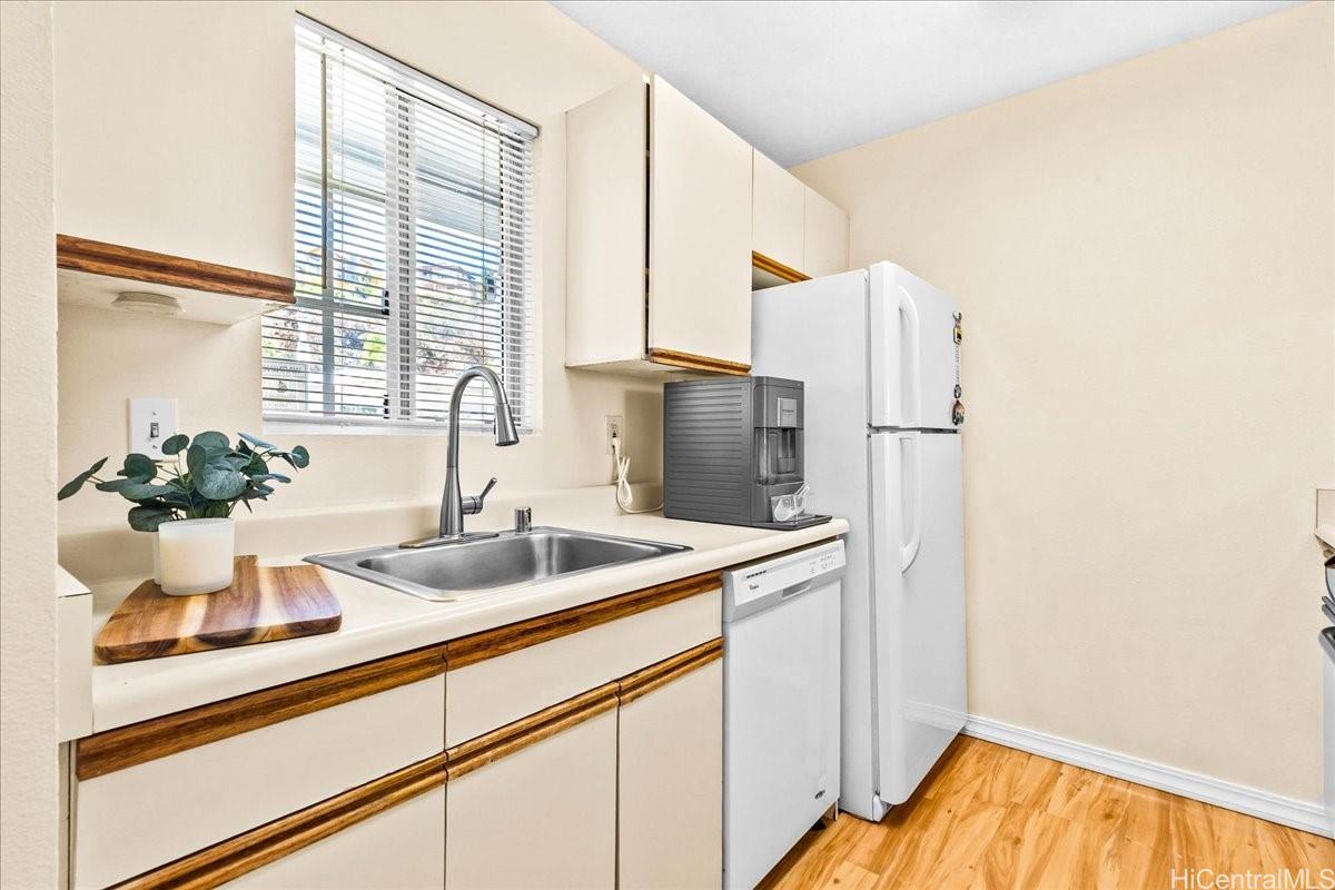 92-1019 Alaa Street, Unit 16203 Kapolei, HI 96707 - Photo 7 of 25 a bathroom with a sink and a mirror