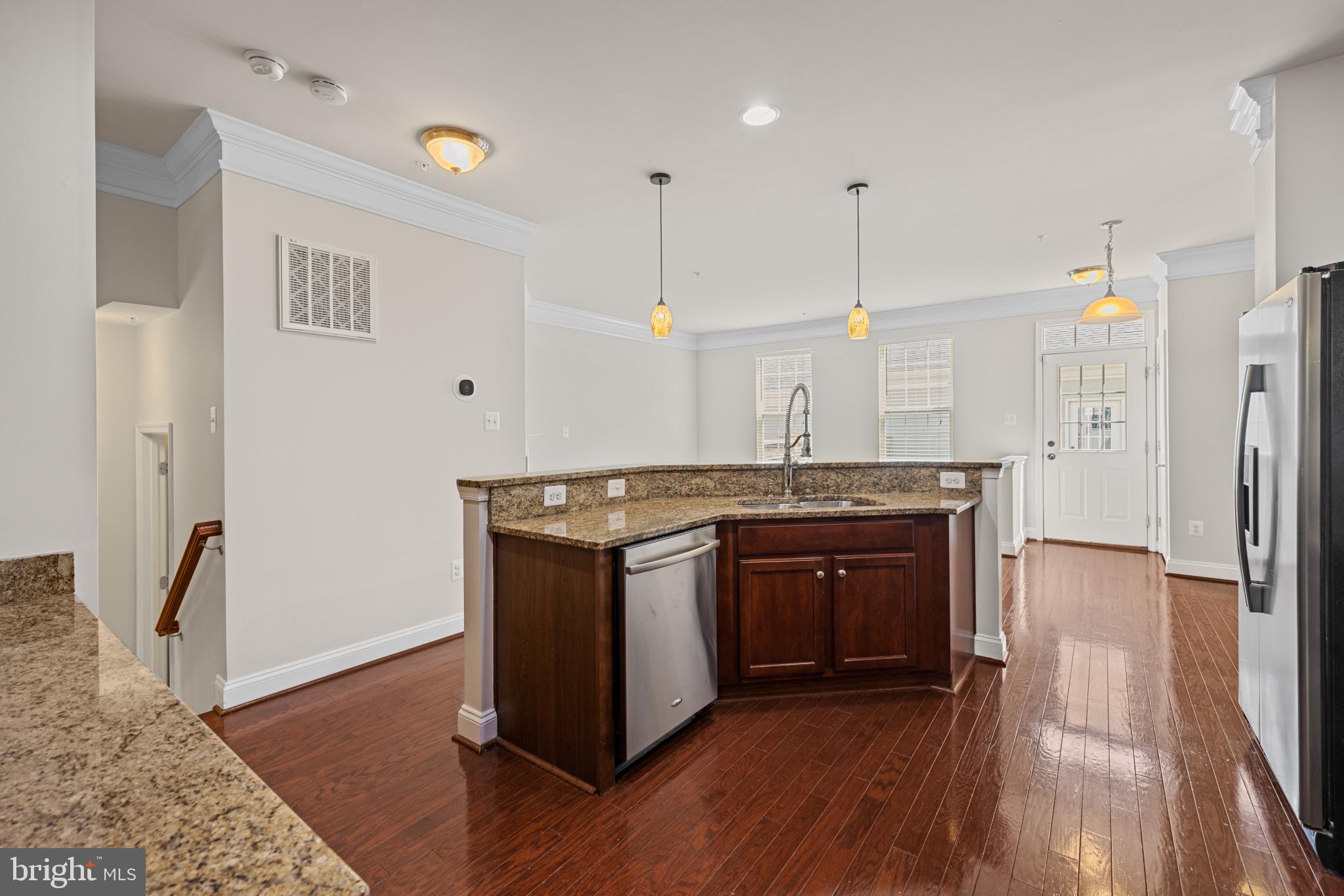 6126 Edward Hill Road Ellicott City, MD 21043 - Photo 15 of 64 Kitchen w/Large Island and pendant lighting