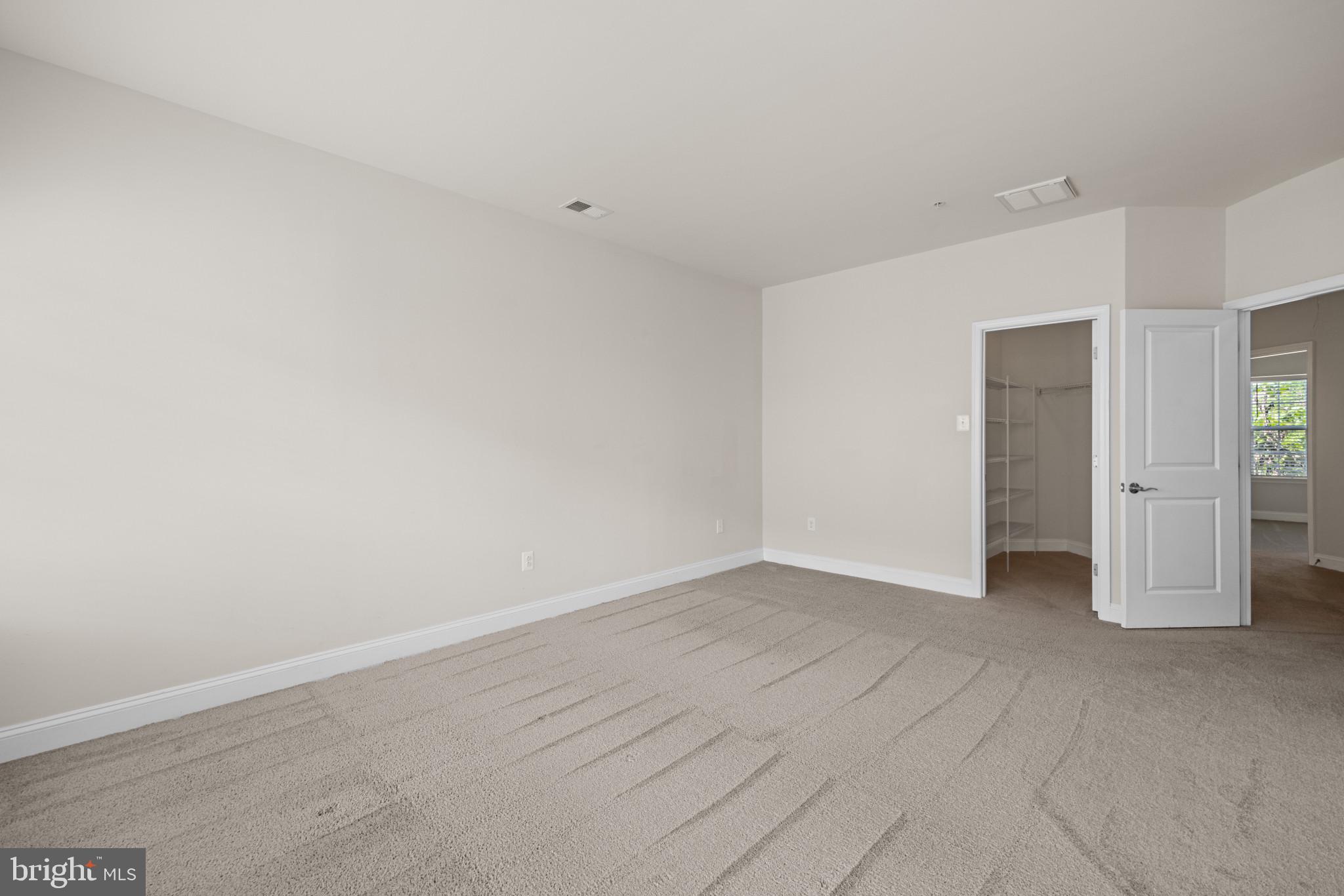6126 Edward Hill Road Ellicott City, MD 21043 - Photo 22 of 64 Primary Bedroom w/ Walk-in Closets