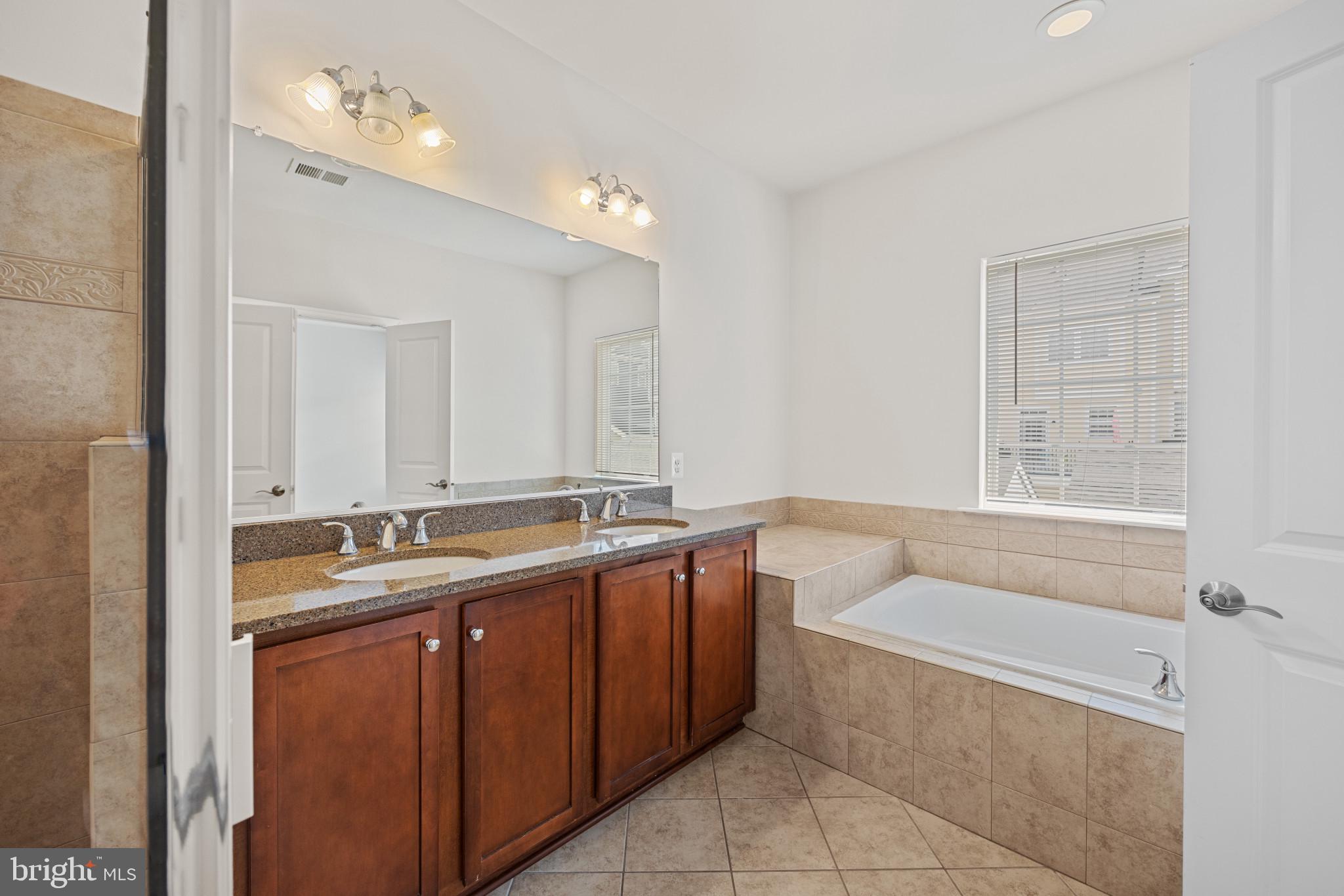 6126 Edward Hill Road Ellicott City, MD 21043 - Photo 29 of 64 Primary Bathroom w/Ceramic tile