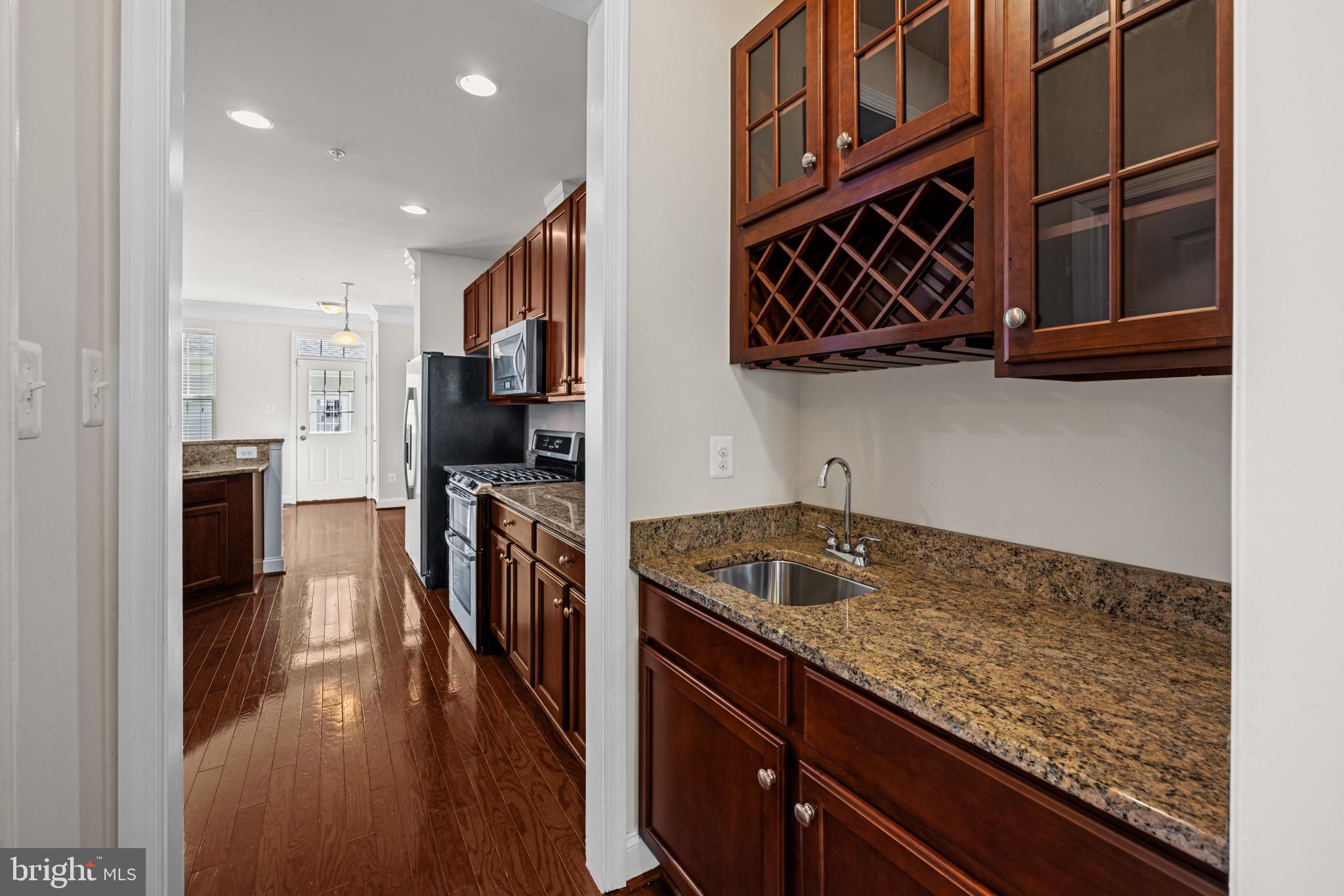 6126 Edward Hill Road Ellicott City, MD 21043 - Photo 9 of 64 Wet Butlers Bar w/granite counter