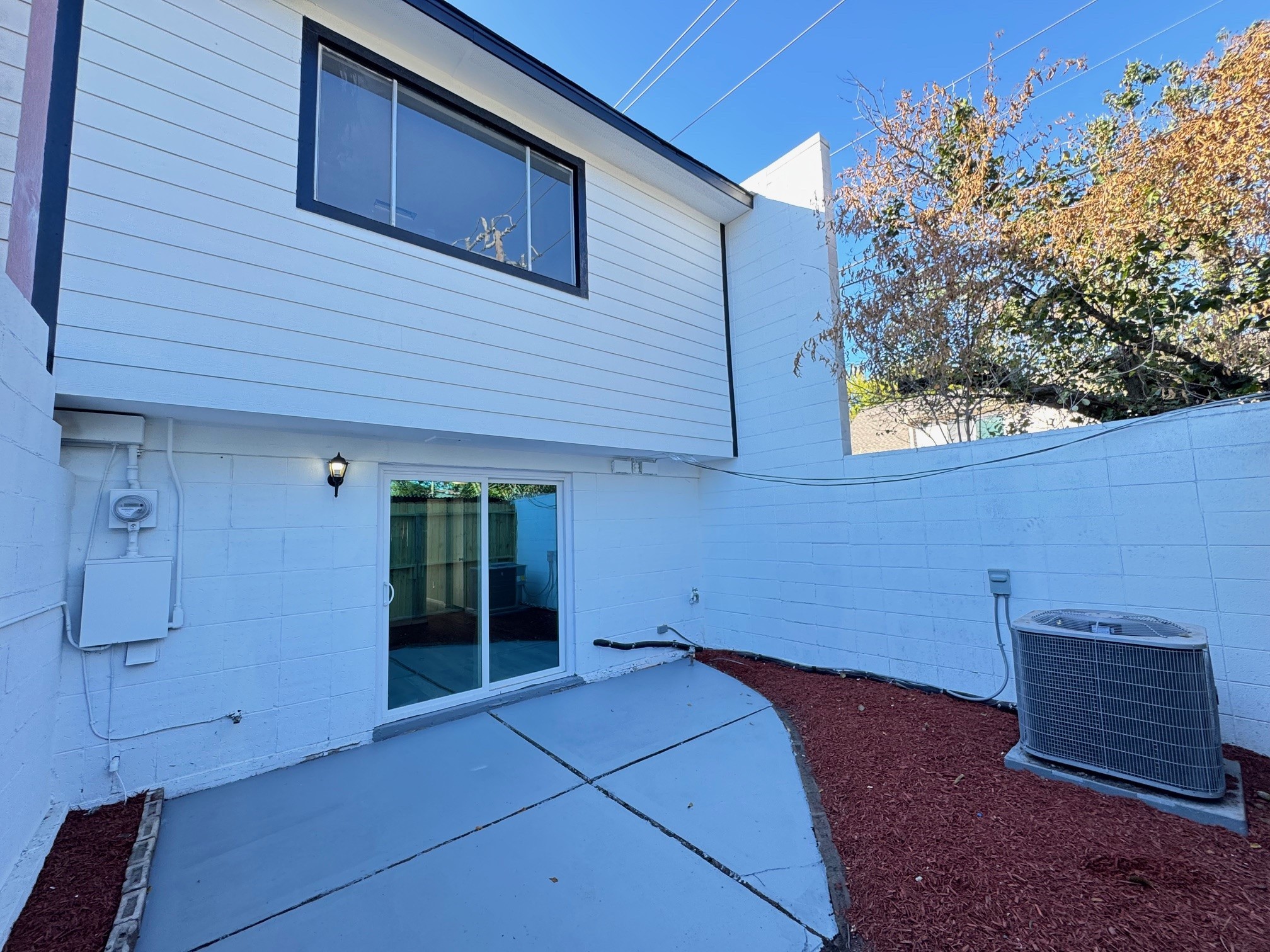 9114 Kempwood Drive, Unit 9114 Houston, TX 77080 - Photo 15 of 16 a backyard of a house