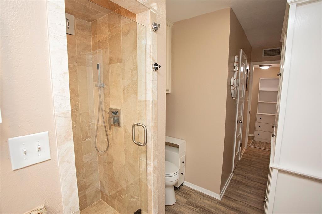 1361 Willow Beach Road, Unit A5 Graford, TX 76449 - Photo 13 of 17 a bathroom with a shower and a toilet