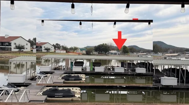 a aerial view of houses with yard