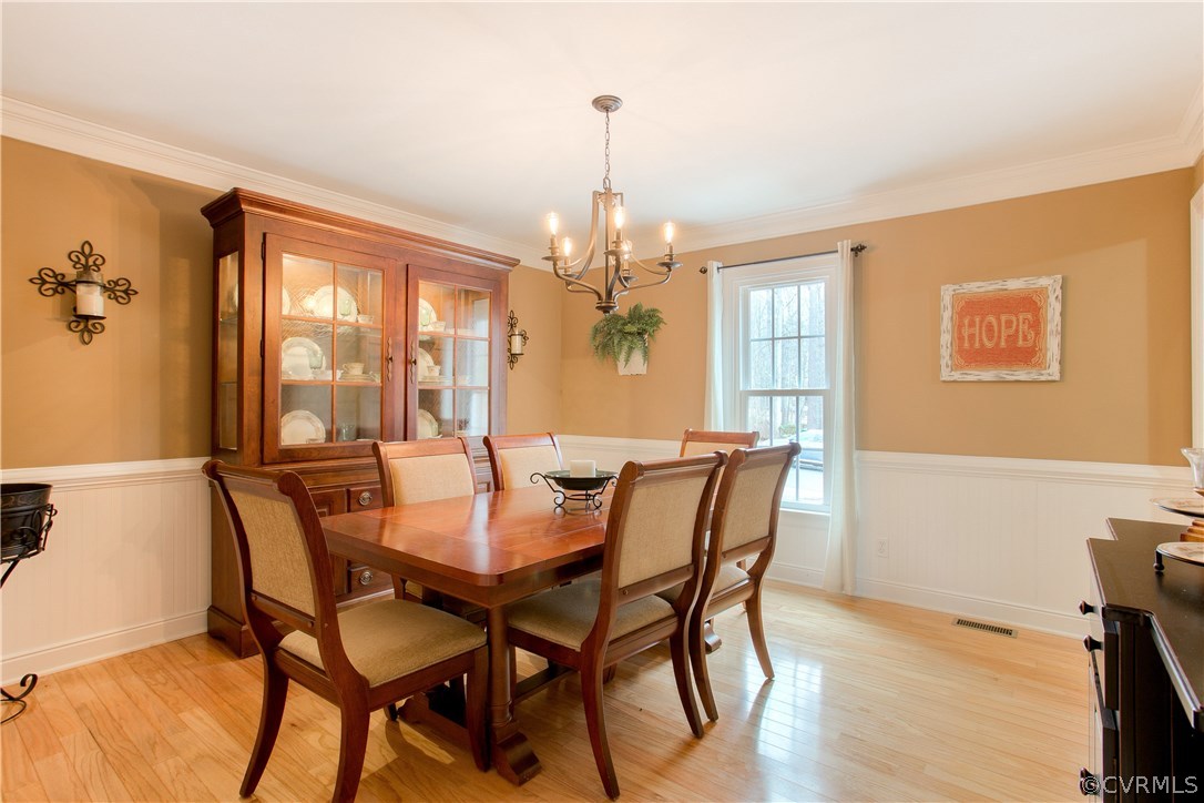 3310 Fortunes Ridge Road Midlothian, VA 23112 - Photo 8 of 29 a view of a dining room with furniture window and outside view