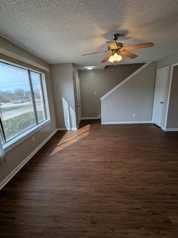 514 East Belt Line Road, Unit B13 DeSoto, TX 75115 - Photo 3 of 28 a view of an empty room with window and wooden floor