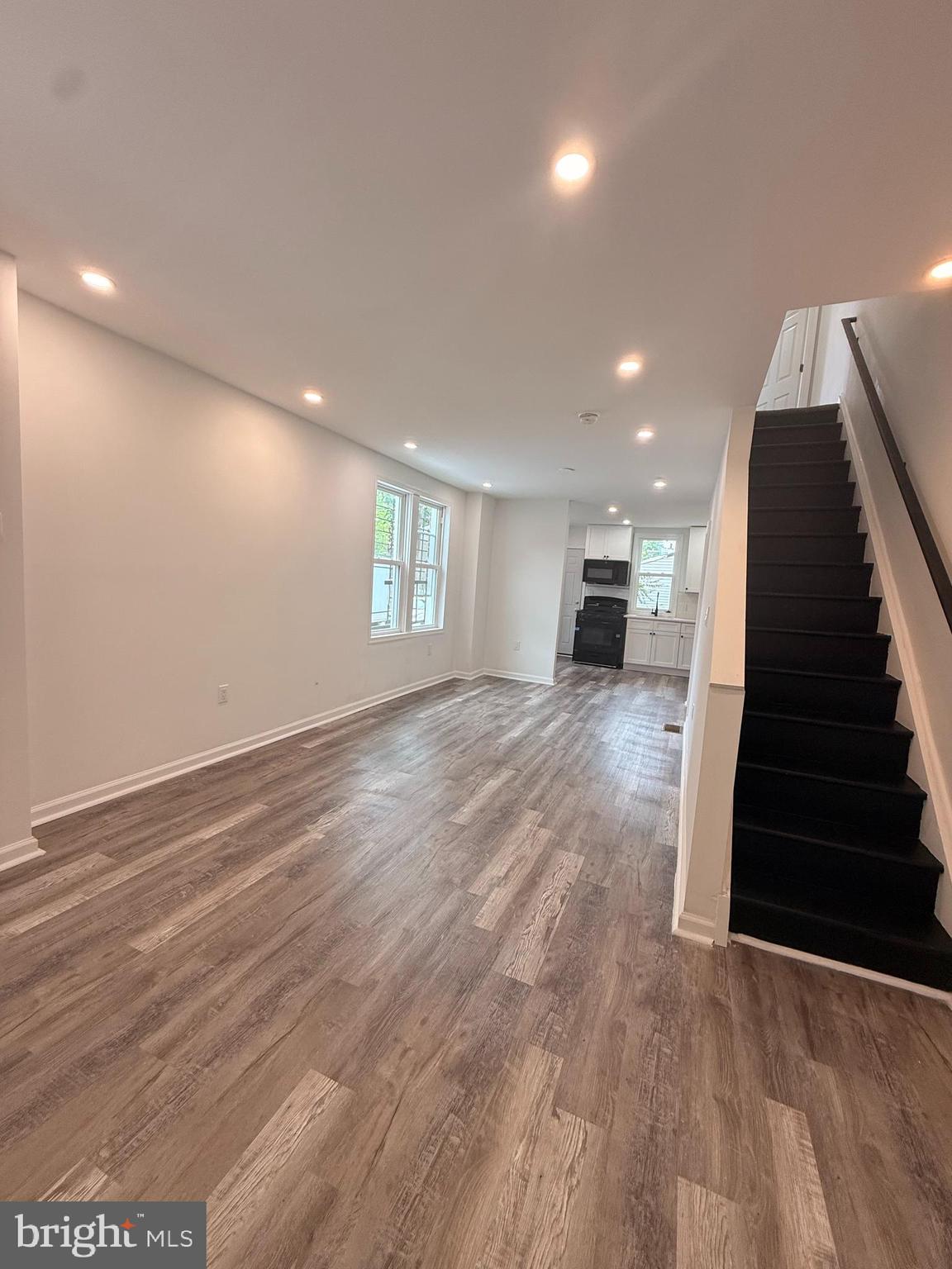 2124 Shields Street Philadelphia, PA 19142 - Photo 3 of 18 living room with staircase to 2nd floor
