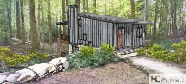 a view of backyard with green space and outdoor seating
