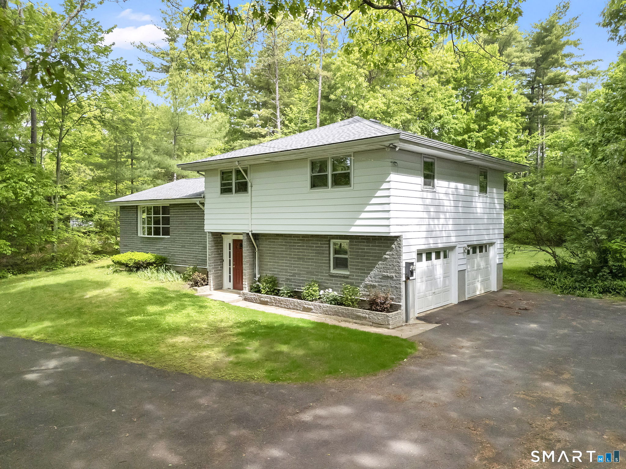 158 Notch Road Granby, CT 06035 - Photo 2 of 40 a front view of house with yard and green space