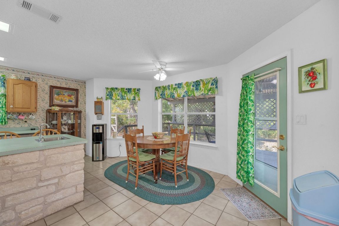 2105 Sam Bass Road Round Rock, TX 78681 - Photo 15 of 40 a living room with furniture and a large window