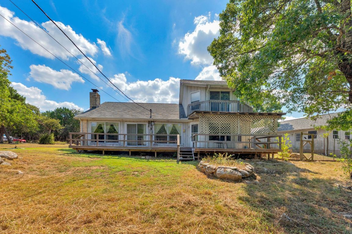 2105 Sam Bass Road Round Rock, TX 78681 - Photo 7 of 40 a view of a house with swimming pool and sitting area