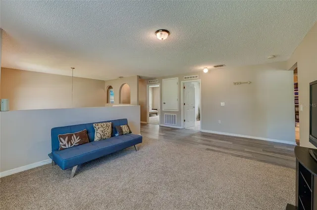 a living room with furniture and a couch