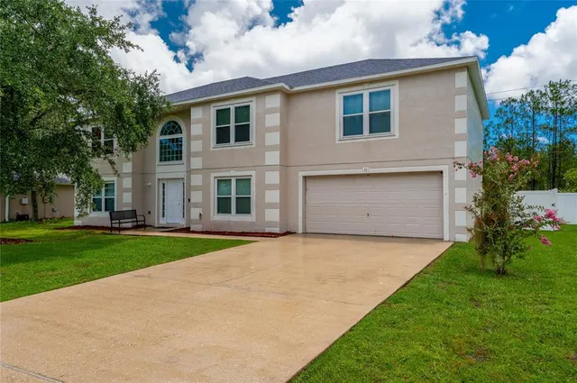 a front view of house with yard