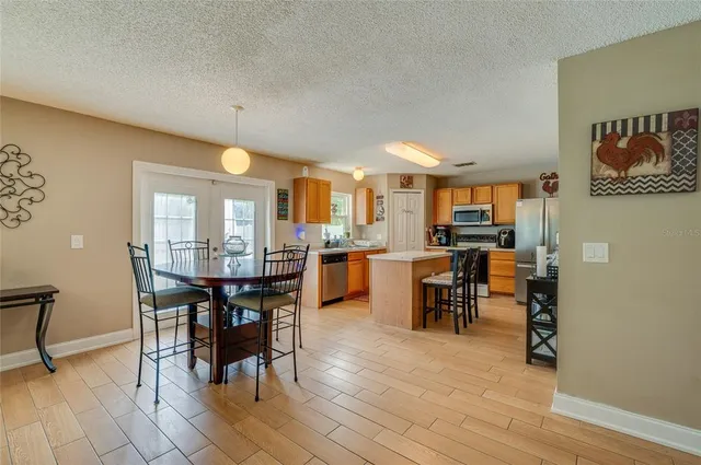 a view of a dining room with furniture