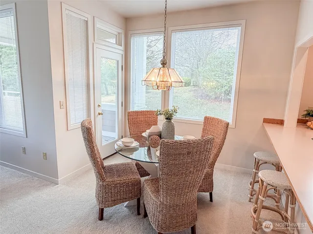 a kitchen with a sink a counter top space and a stove