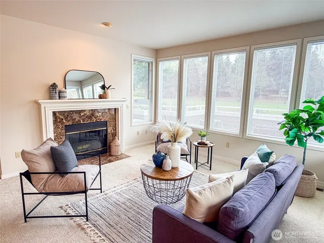a kitchen with a refrigerator and cabinets
