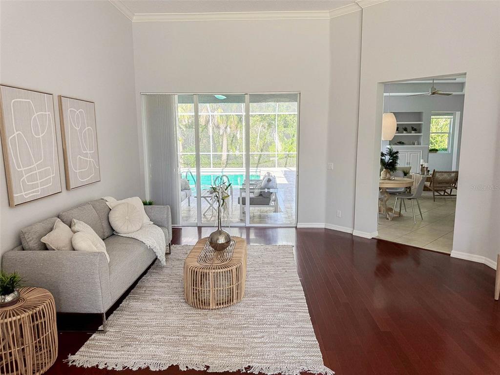 8204 Waterview Boulevard Lakewood Ranch, FL 34202 - Photo 14 of 77 a living room with furniture and a large window