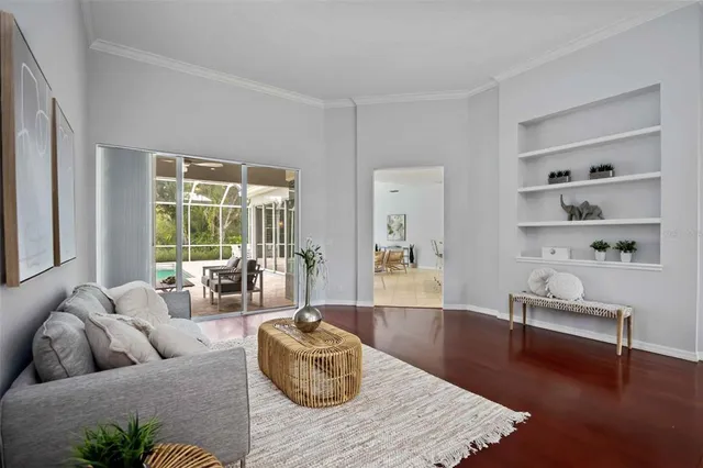 a kitchen with stainless steel appliances kitchen island granite countertop a sink and cabinets