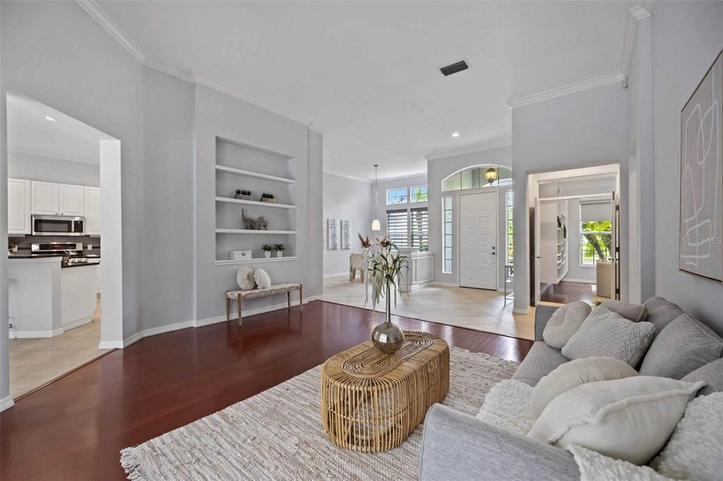 8204 Waterview Boulevard Lakewood Ranch, FL 34202 - Photo 16 of 77 a living room with furniture and wooden floor