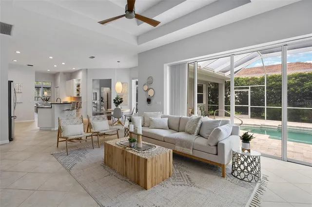 a kitchen with stainless steel appliances a refrigerator and a stove top oven