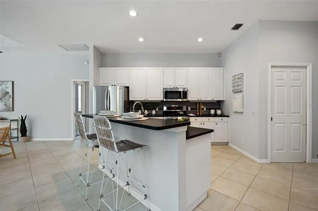 a view of empty room with fan