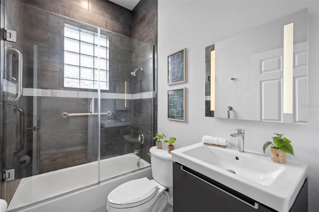 8204 Waterview Boulevard Lakewood Ranch, FL 34202 - Photo 34 of 77 a bathroom with a sink toilet and shower