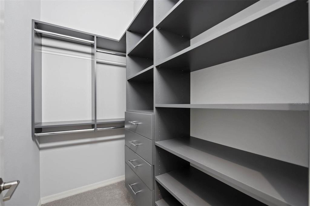 8204 Waterview Boulevard Lakewood Ranch, FL 34202 - Photo 39 of 77 a room with storage and utility