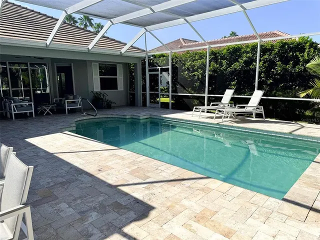 a aerial view of a house with yard and plants