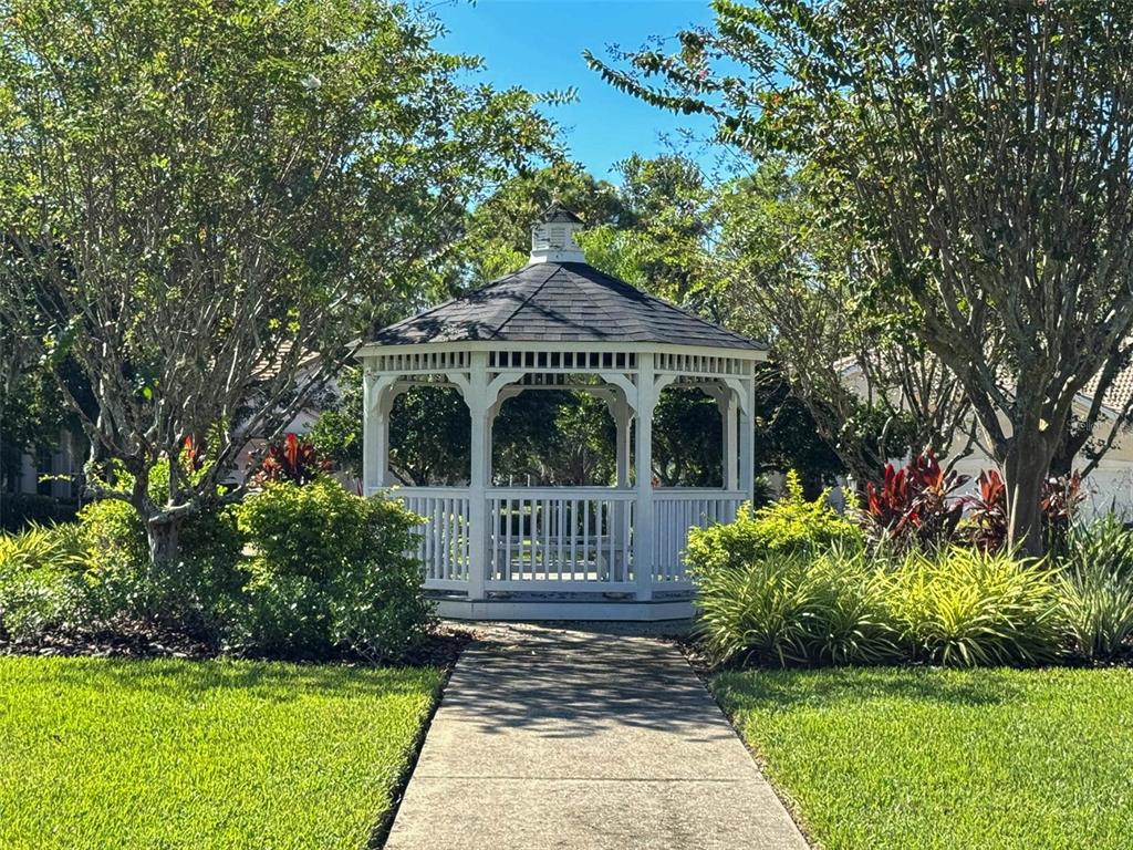 8204 Waterview Boulevard Lakewood Ranch, FL 34202 - Photo 57 of 77 a front view of a house with garden