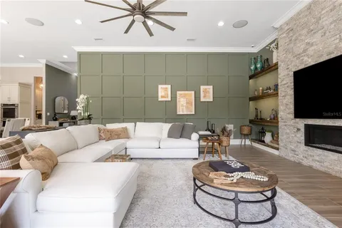 a kitchen with stainless steel appliances granite countertop a stove sink and cabinets