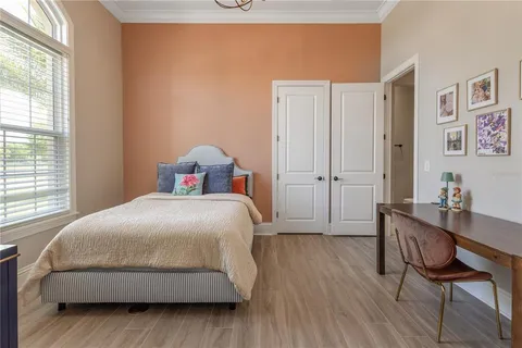 a living room with furniture and white walls