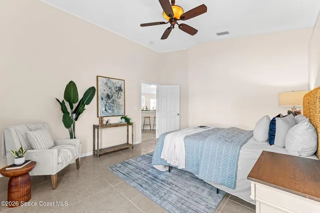 a bedroom with a bed and furniture