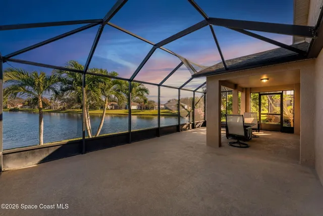 a view of an empty room with a couch