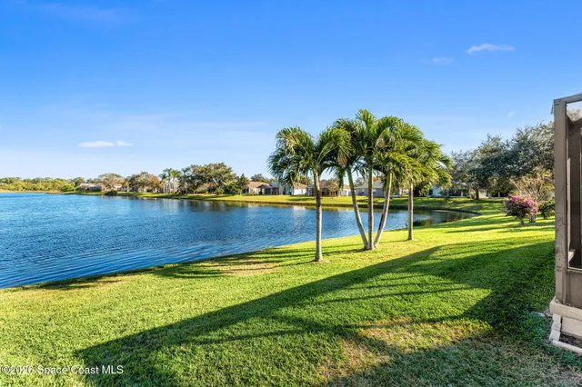 a view of a house with a big yard