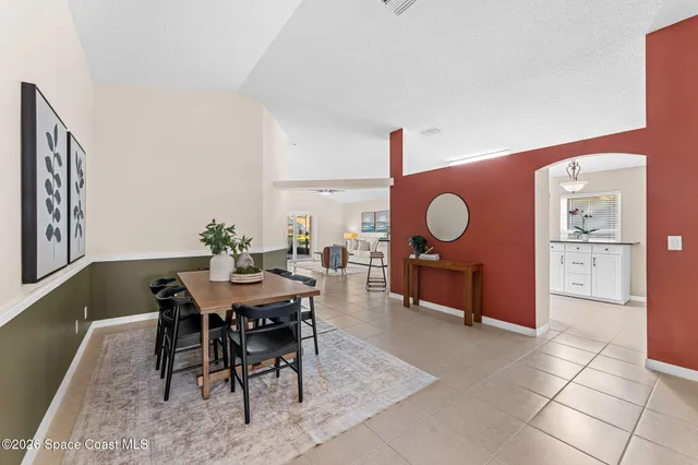 a view of a dining room with furniture