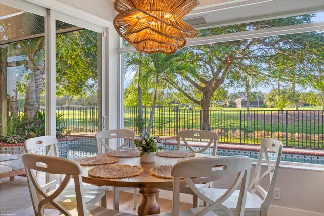 a bathroom with a sink toilet vanity and shower