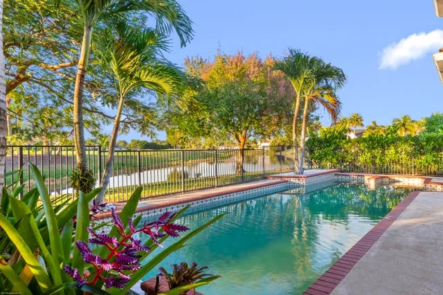 a view of a lake with a sitting area