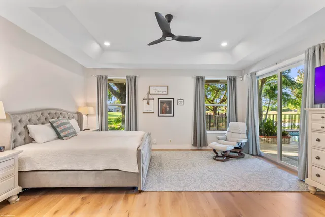 a bathroom with a double vanity sink and a large mirror