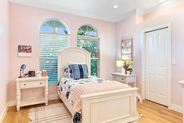 a bathroom with a shower sink and a mirror