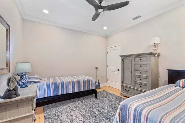 a room with a closet and a wooden floor