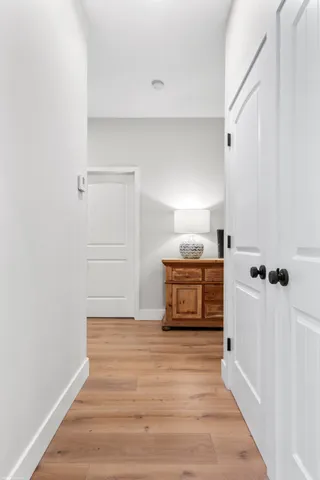 a view of swimming pool with a patio and a garden