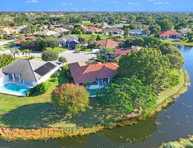 an aerial view of residential houses and outdoor space