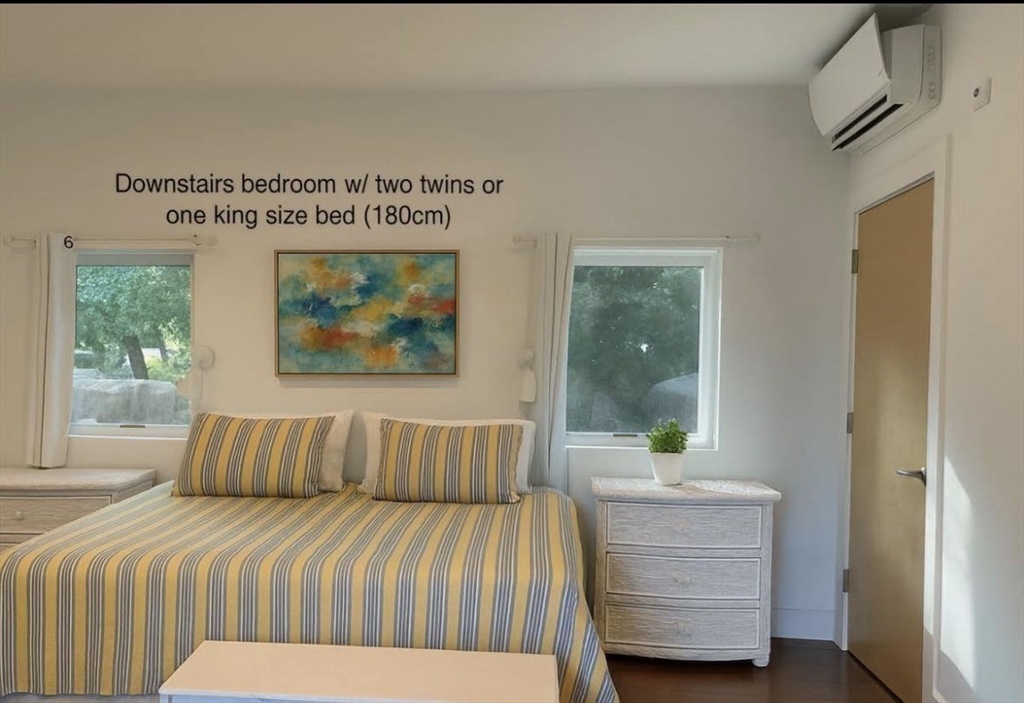 25 Sturges Road, Unit 1 Sharon, MA 02067 - Photo 8 of 11 a bedroom with a bed and window