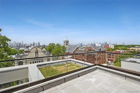 a view of swimming pool with outdoor seating