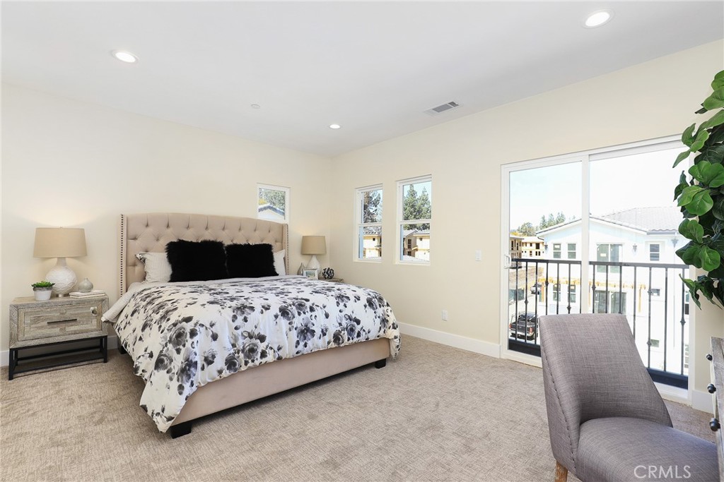 1 Turnberry Lane Phillips Ranch, CA 91766 - Photo 25 of 63 a bedroom with a bed and a couch